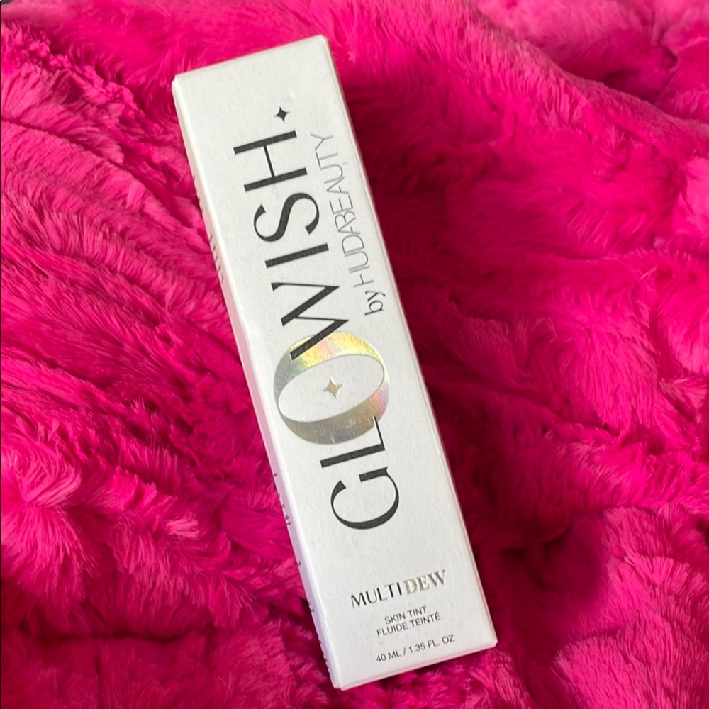 HUDA BEAUTY GloWish Multidew Skin Tint in White Packaging